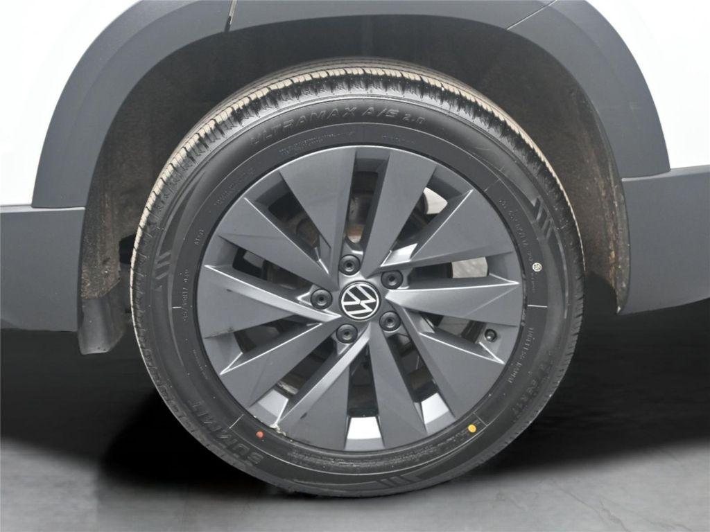 used 2023 Volkswagen Taos car, priced at $15,000