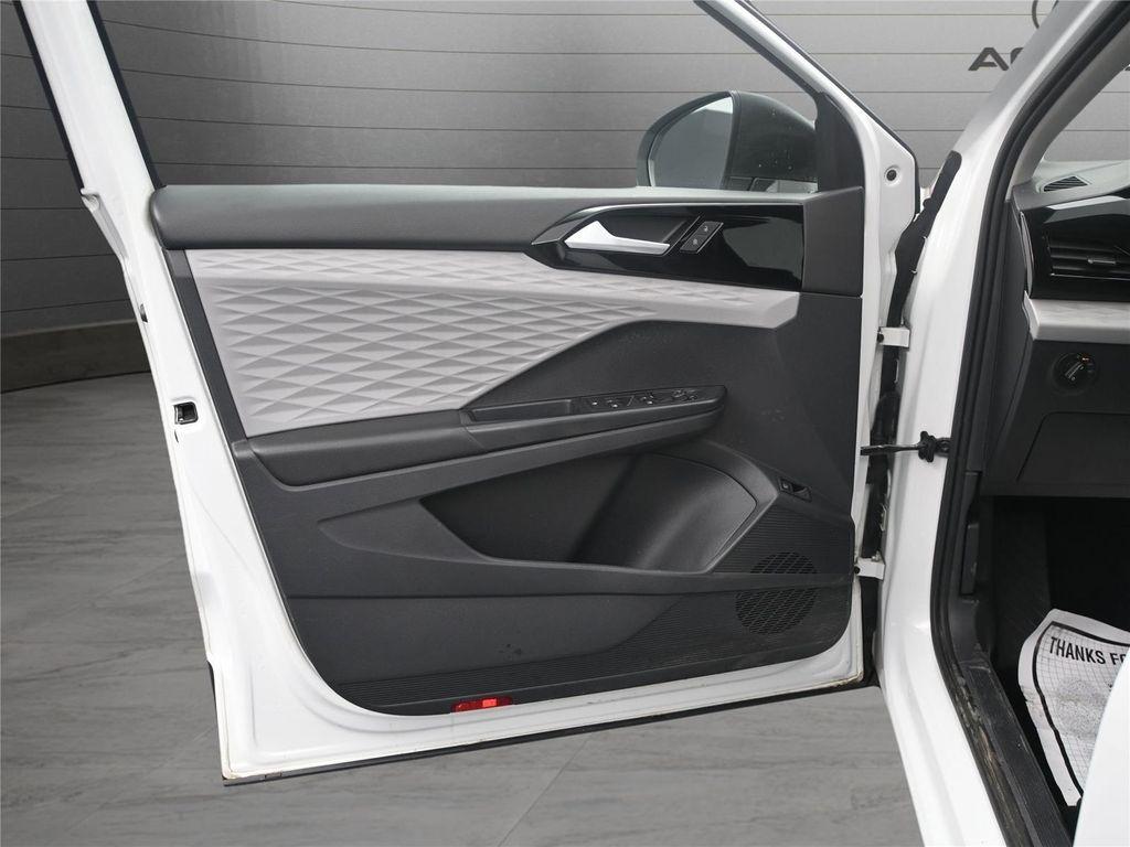 used 2023 Volkswagen Taos car, priced at $15,000