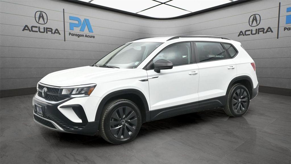used 2023 Volkswagen Taos car, priced at $15,000