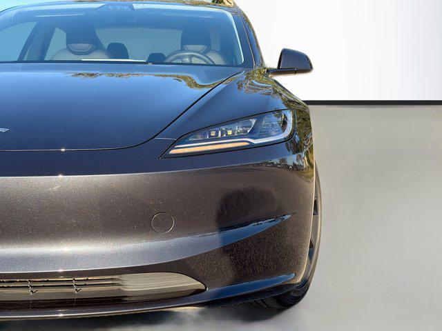 used 2025 Tesla Model 3 car, priced at $32,039