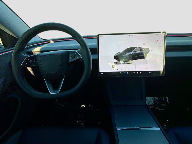 used 2025 Tesla Model 3 car, priced at $32,039