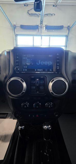 used 2012 Jeep Wrangler Unlimited car, priced at $13,500