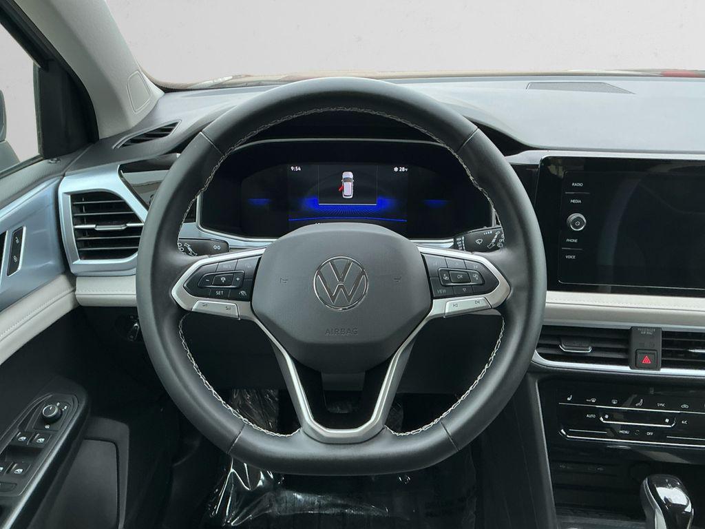 used 2025 Volkswagen Taos car, priced at $27,698