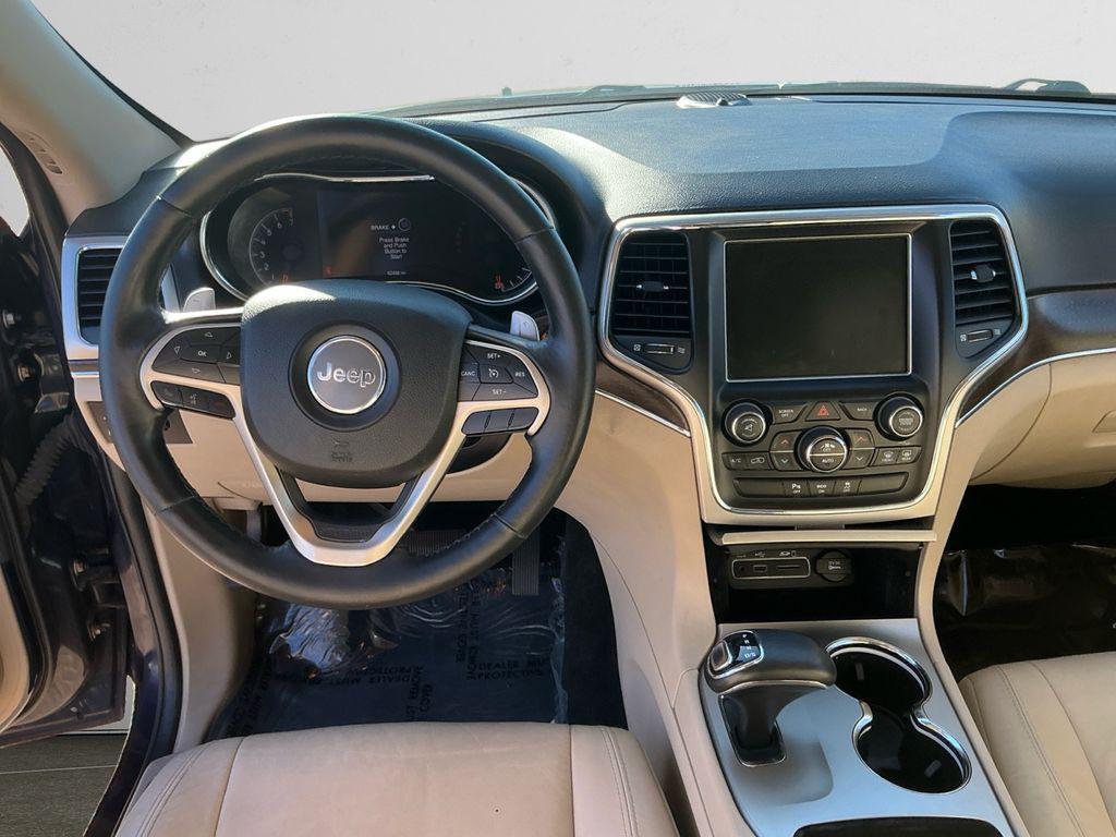 used 2014 Jeep Grand Cherokee car, priced at $13,698