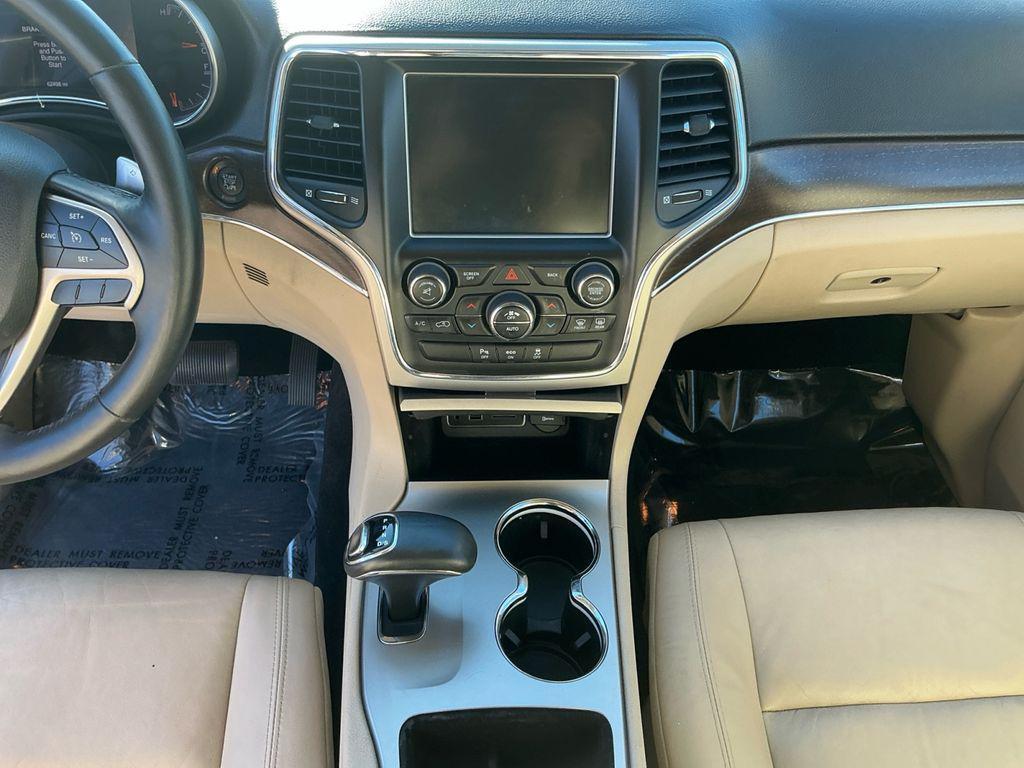 used 2014 Jeep Grand Cherokee car, priced at $13,698