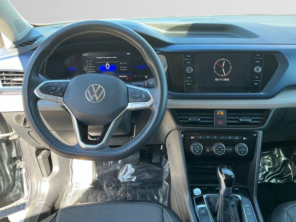 used 2024 Volkswagen Taos car, priced at $20,237