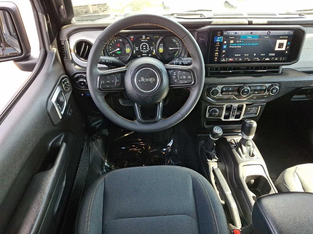 used 2024 Jeep Wrangler 4xe car, priced at $30,998