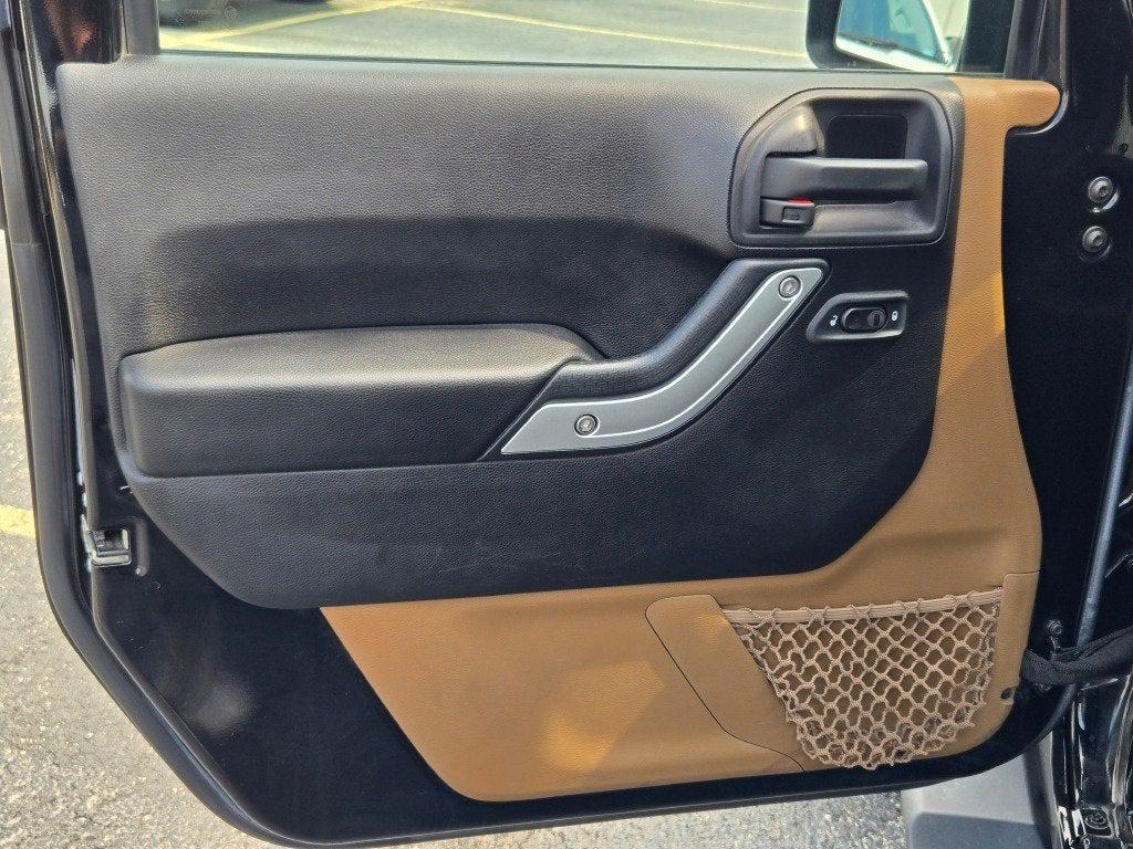 used 2015 Jeep Wrangler Unlimited car, priced at $20,290