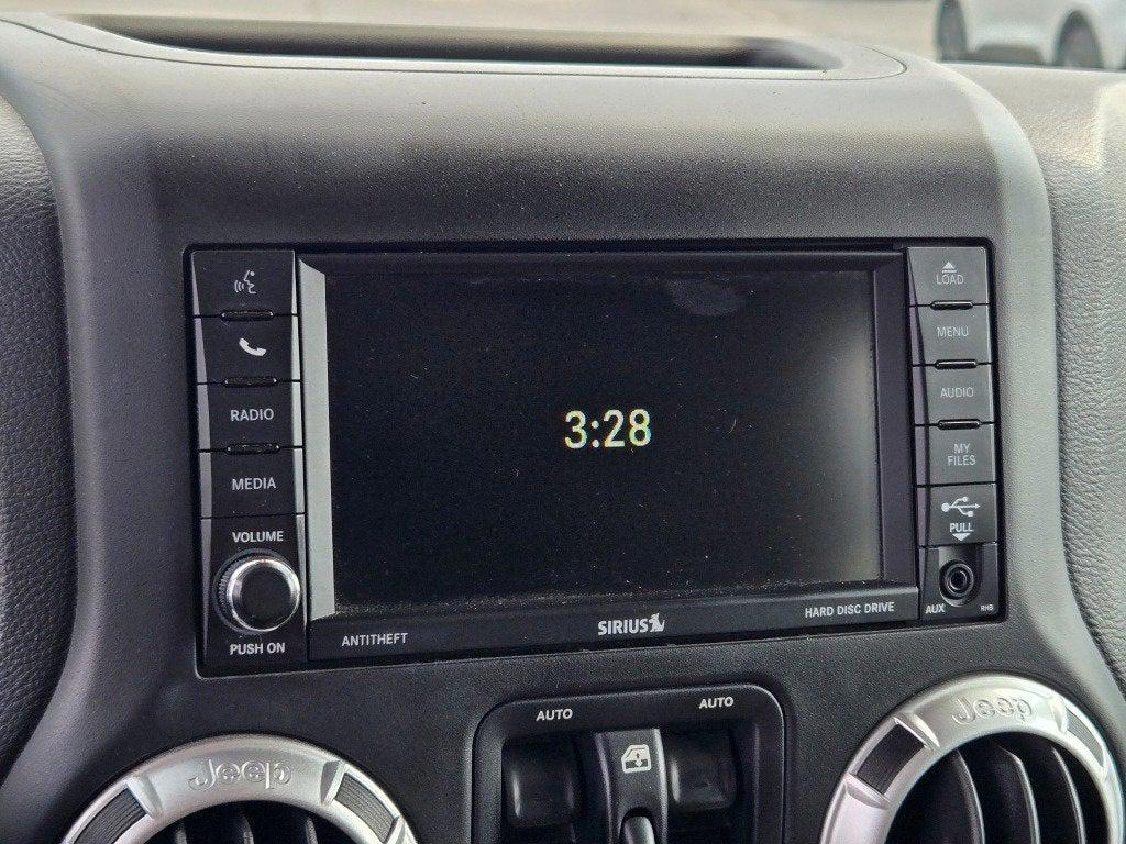 used 2015 Jeep Wrangler Unlimited car, priced at $20,290