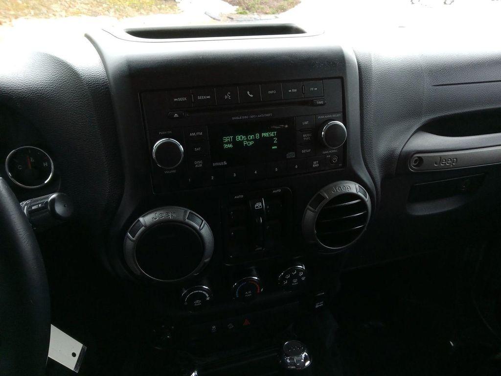 used 2014 Jeep Wrangler Unlimited car, priced at $19,533