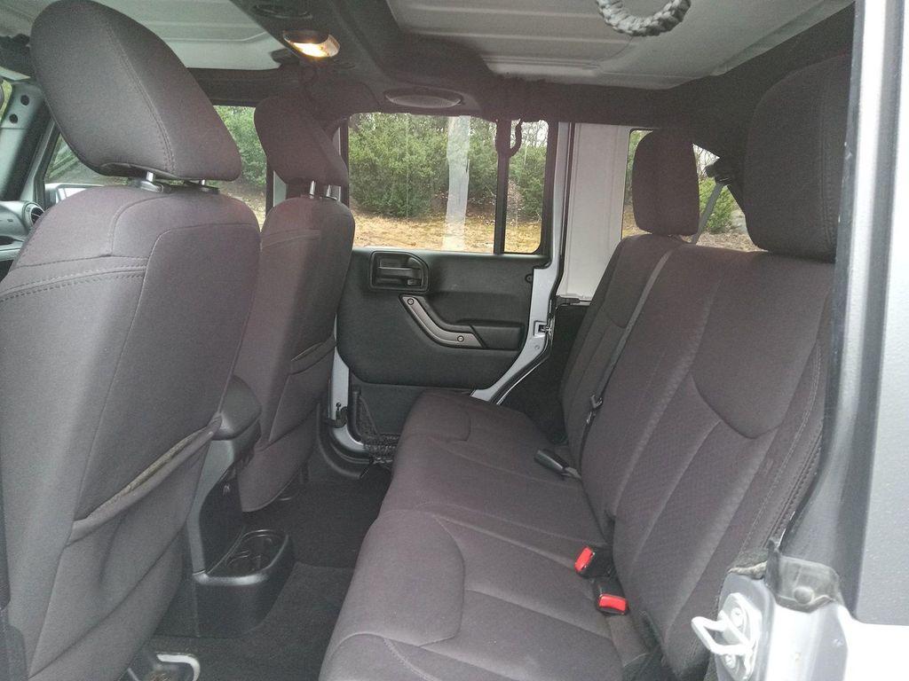 used 2014 Jeep Wrangler Unlimited car, priced at $19,533