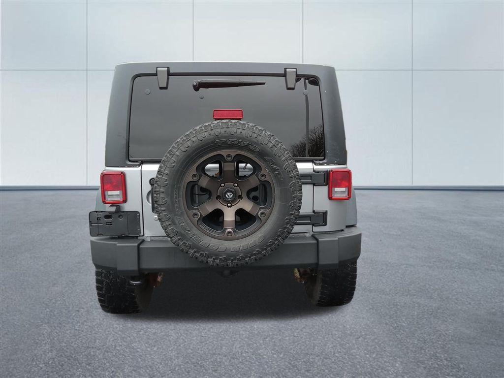 used 2014 Jeep Wrangler Unlimited car, priced at $19,533