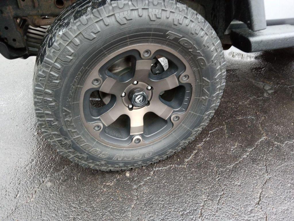 used 2014 Jeep Wrangler Unlimited car, priced at $19,533