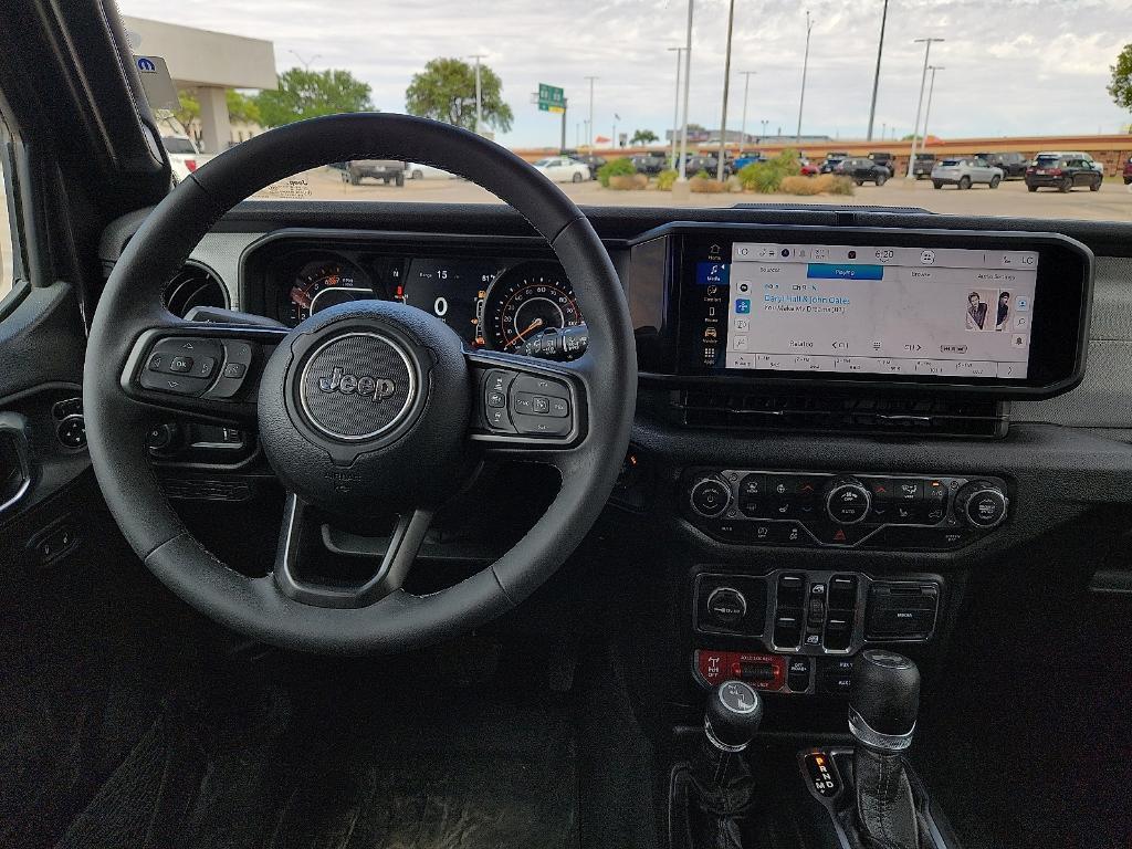 used 2025 Jeep Wrangler car, priced at $39,220