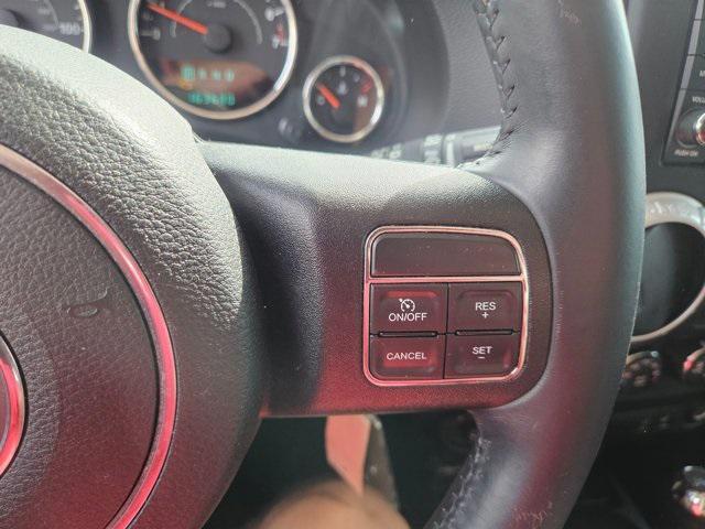 used 2014 Jeep Wrangler Unlimited car, priced at $12,927