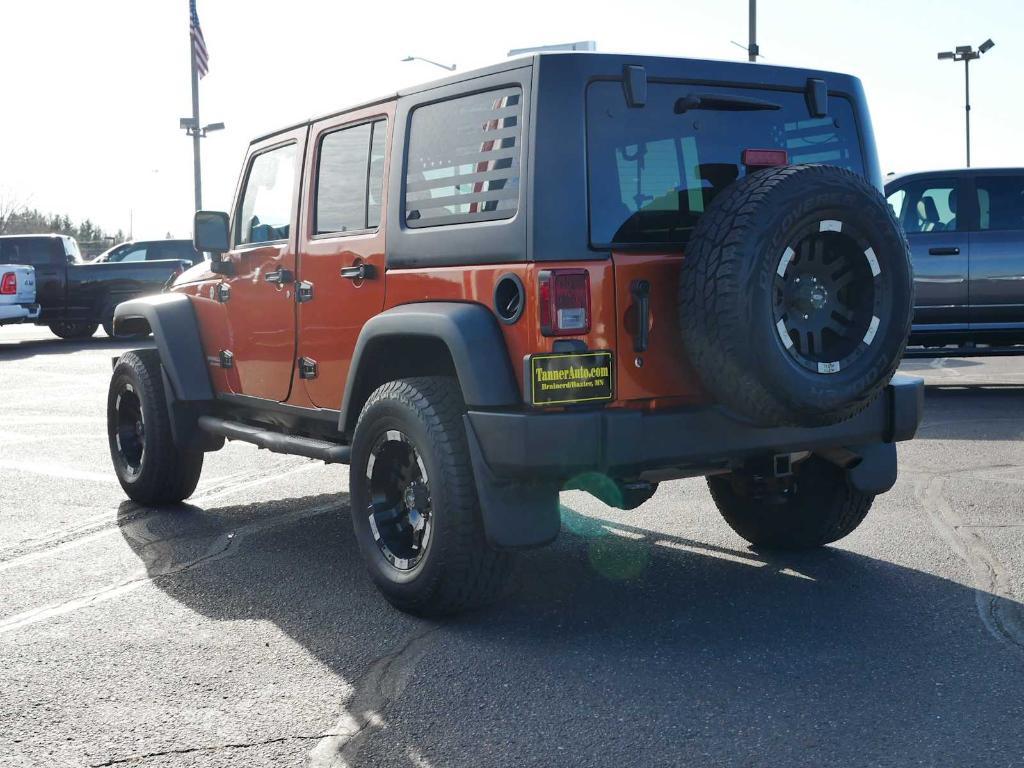 used 2011 Jeep Wrangler Unlimited car, priced at $13,444