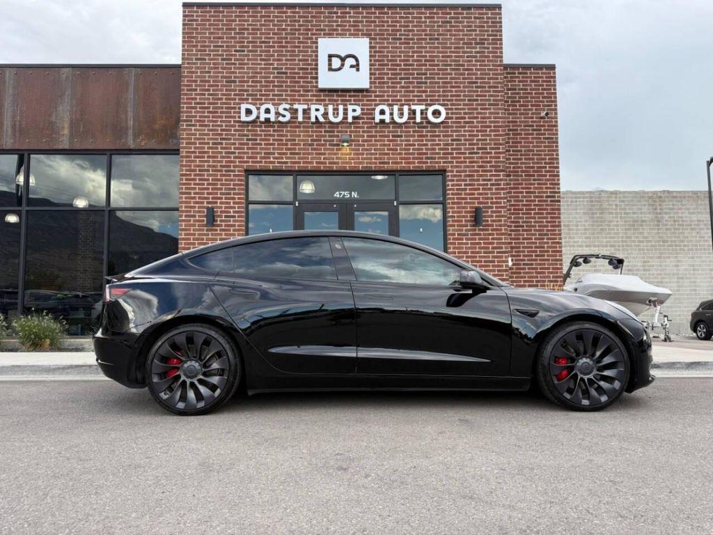 used 2022 Tesla Model 3 car, priced at $30,995
