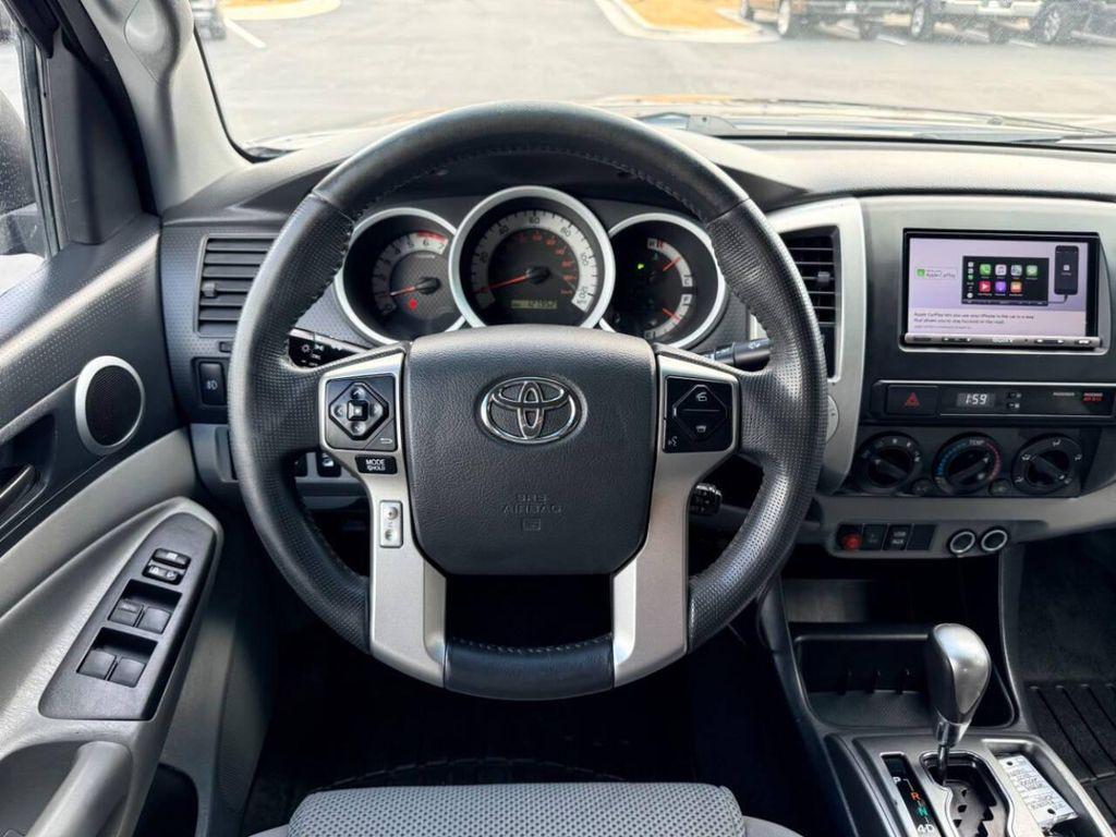 used 2014 Toyota Tacoma car, priced at $23,995