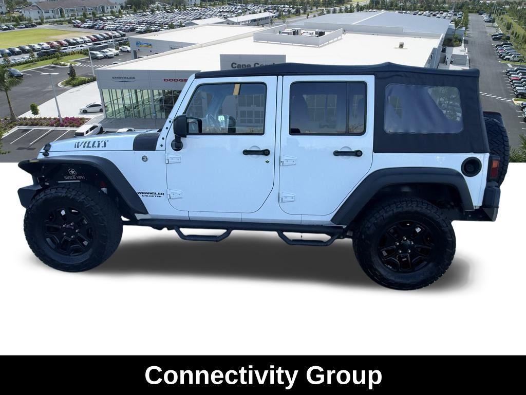used 2016 Jeep Wrangler Unlimited car, priced at $18,377