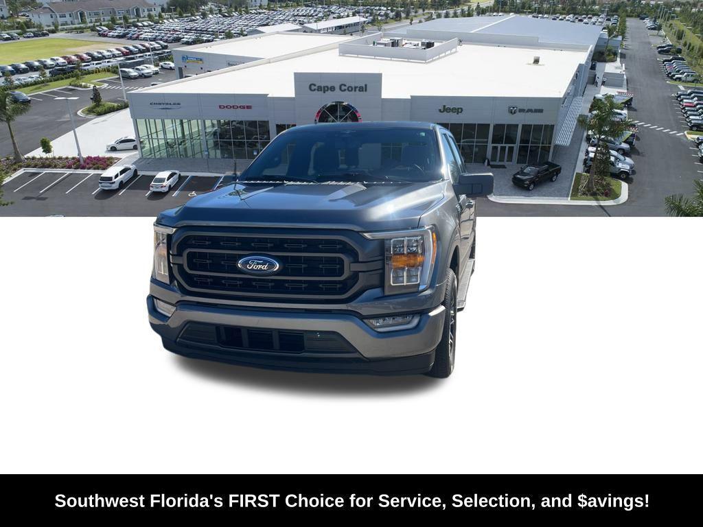 used 2023 Ford F-150 car, priced at $34,404