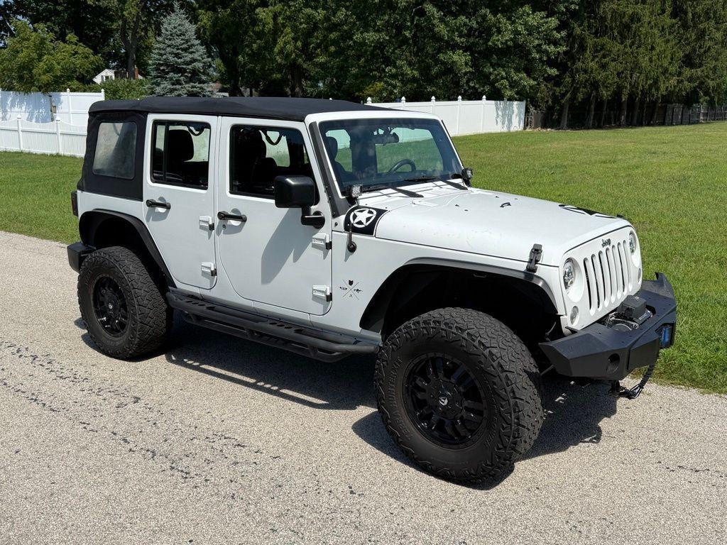 used 2017 Jeep Wrangler Unlimited car, priced at $13,987