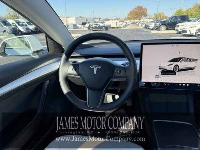 used 2023 Tesla Model 3 car, priced at $25,697