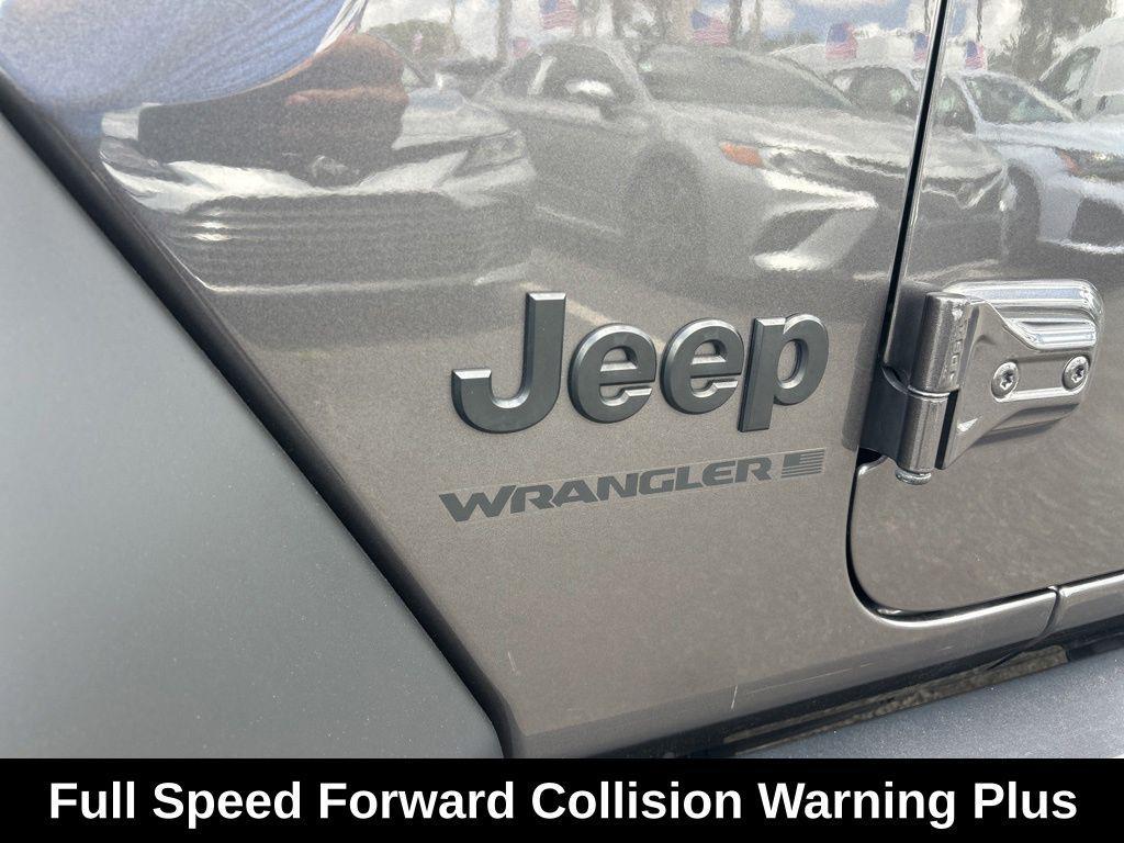 used 2024 Jeep Wrangler car, priced at $30,302
