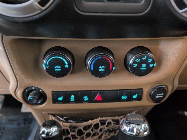 used 2012 Jeep Wrangler Unlimited car, priced at $12,896