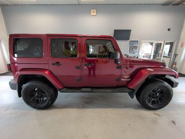 used 2012 Jeep Wrangler Unlimited car, priced at $12,896