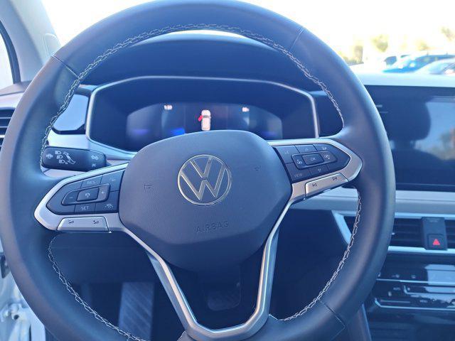 used 2025 Volkswagen Taos car, priced at $24,500