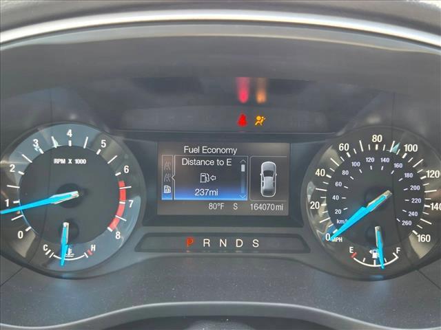 used 2015 Ford Fusion car, priced at $6,995