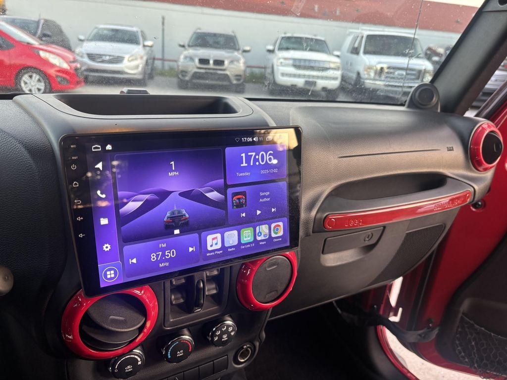 used 2014 Jeep Wrangler Unlimited car, priced at $9,995