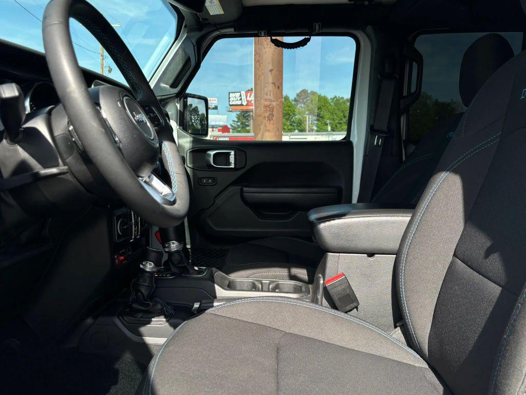 used 2023 Jeep Wrangler 4xe car, priced at $34,699