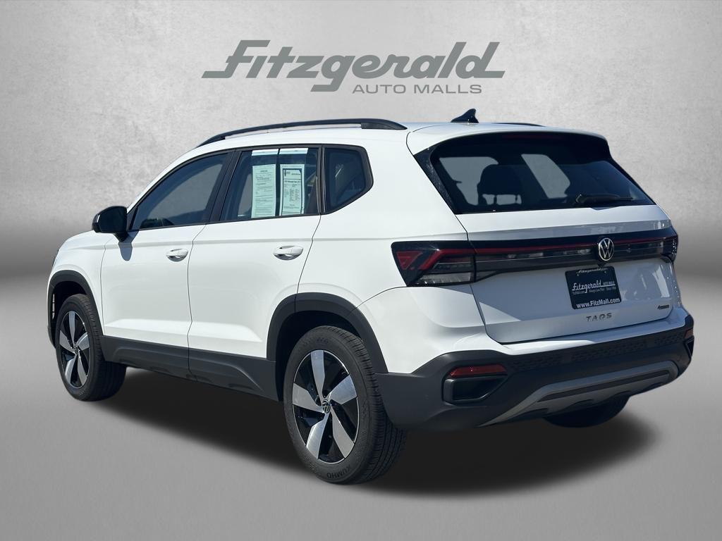 used 2025 Volkswagen Taos car, priced at $22,988