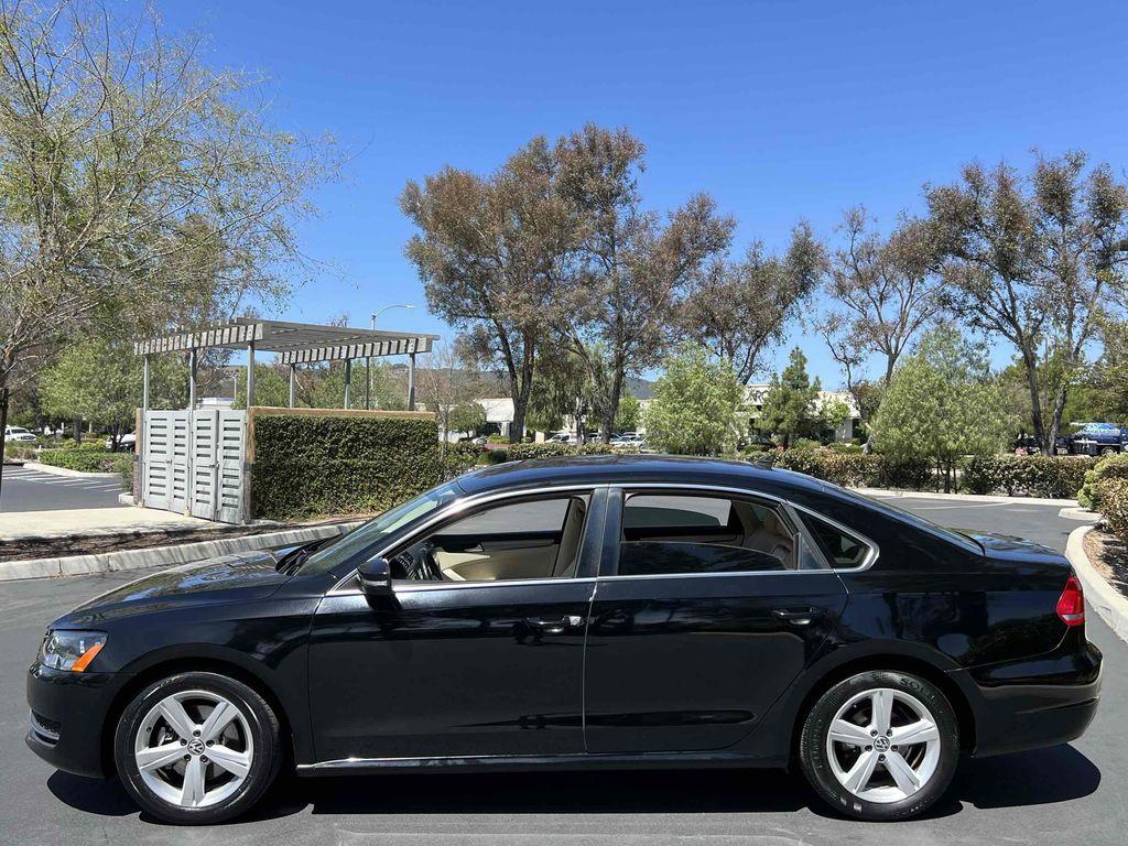 used 2014 Volkswagen Passat car, priced at $4,990