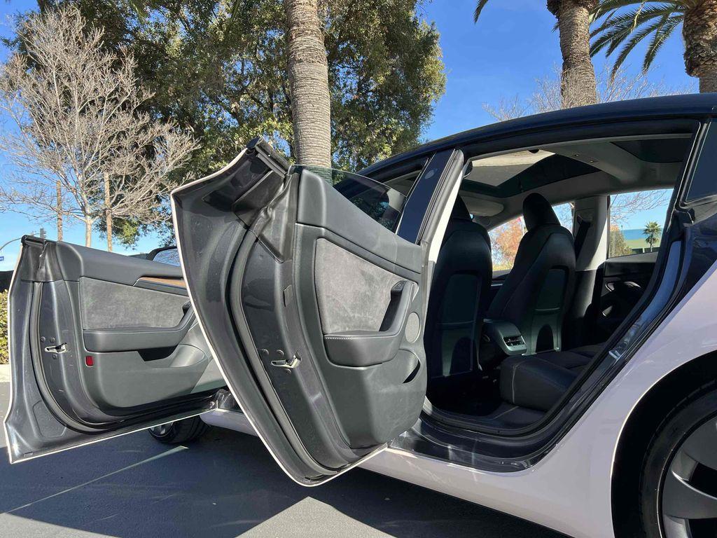 used 2023 Tesla Model 3 car, priced at $32,990