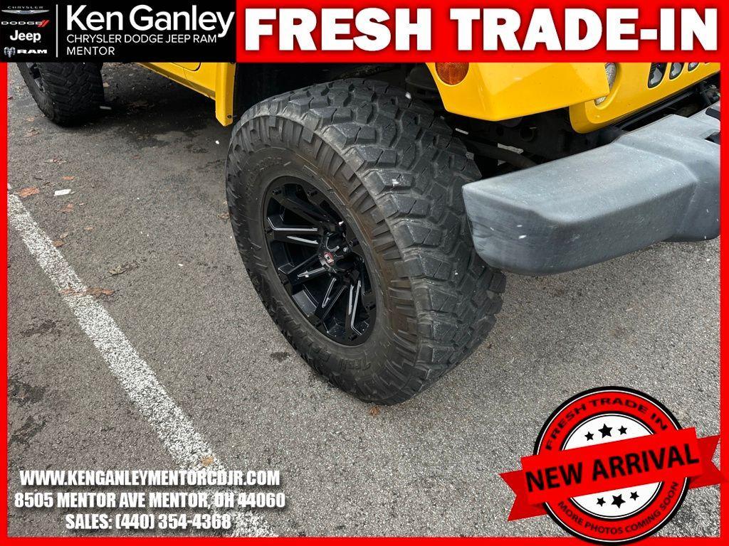 used 2015 Jeep Wrangler Unlimited car, priced at $13,900