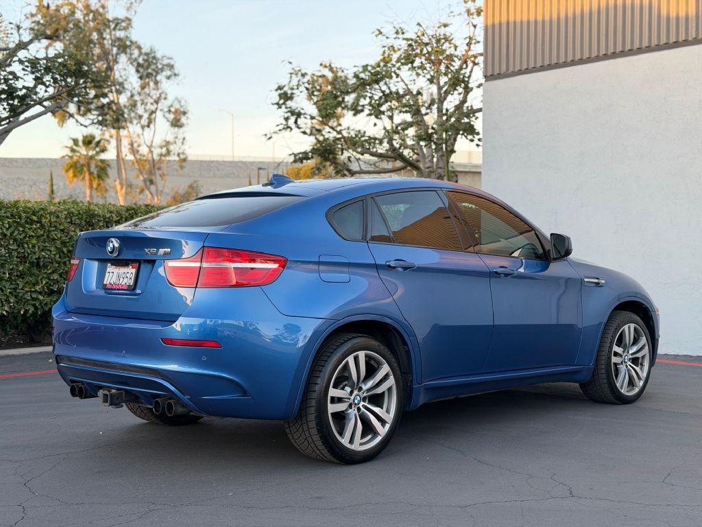used 2013 BMW X6 M car, priced at $24,973