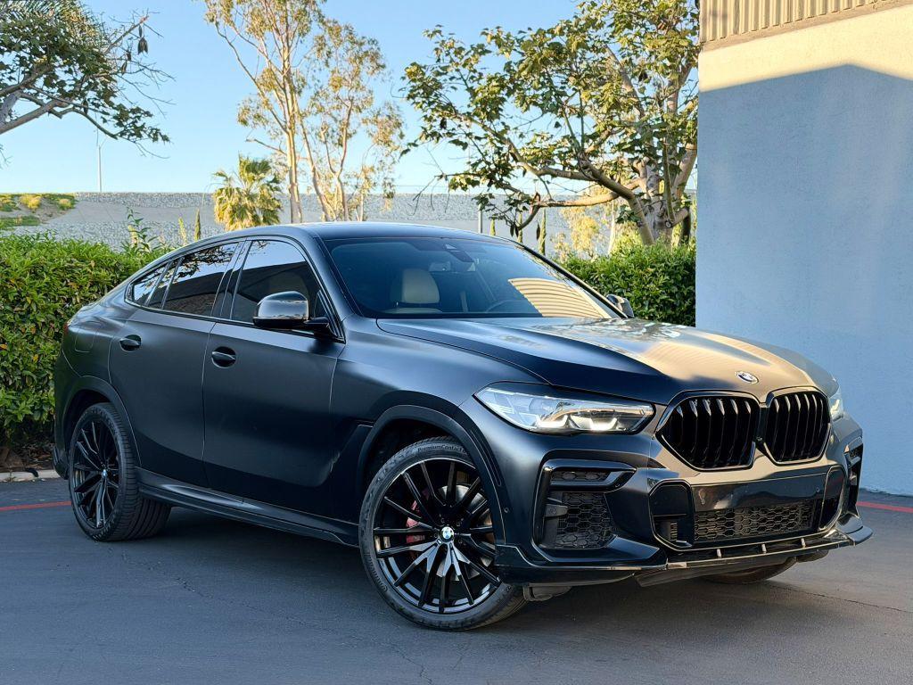 used 2023 BMW X6 car, priced at $44,973