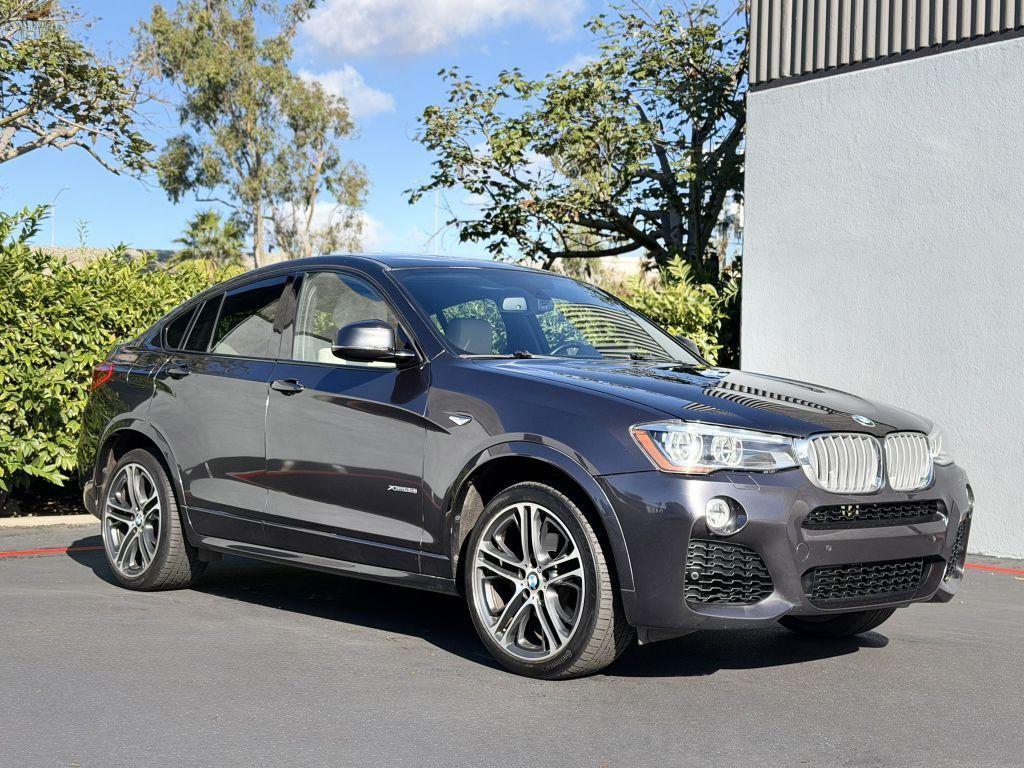 used 2015 BMW X4 car, priced at $15,973