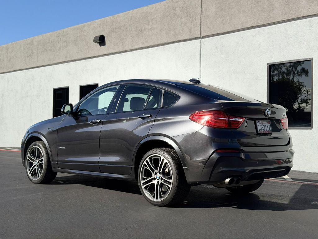 used 2015 BMW X4 car, priced at $15,973