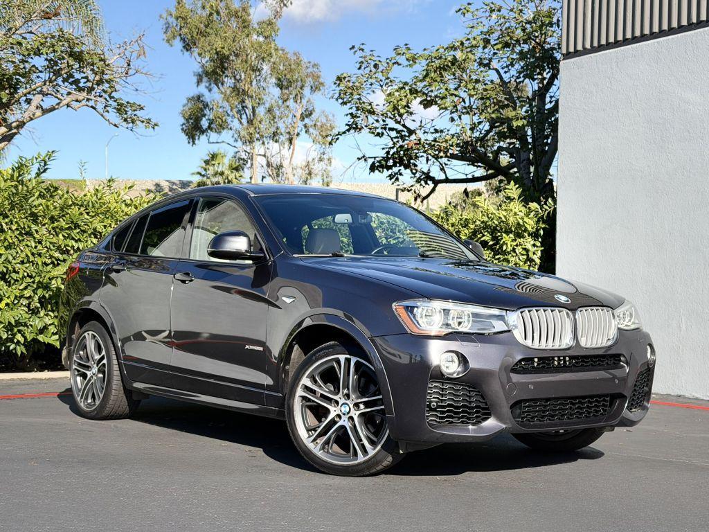 used 2015 BMW X4 car, priced at $15,973