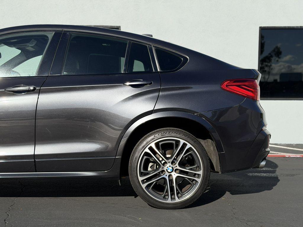 used 2015 BMW X4 car, priced at $15,973