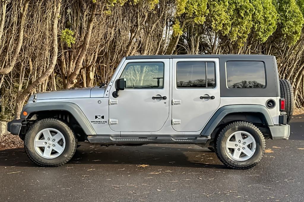 used 2009 Jeep Wrangler Unlimited car, priced at $11,970