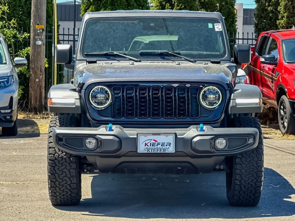 used 2024 Jeep Wrangler 4xe car, priced at $31,353