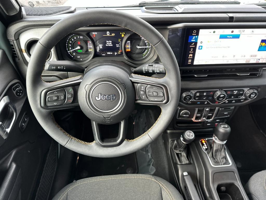 used 2024 Jeep Wrangler 4xe car, priced at $29,256