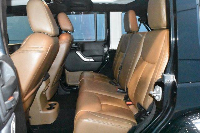 used 2014 Jeep Wrangler Unlimited car, priced at $16,240