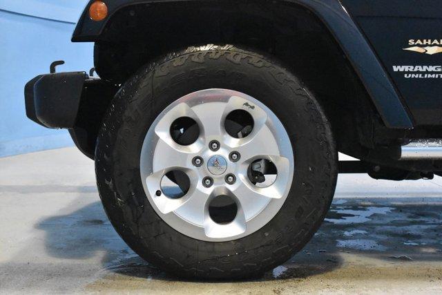 used 2014 Jeep Wrangler Unlimited car, priced at $16,240