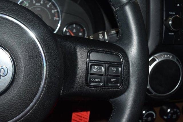 used 2014 Jeep Wrangler Unlimited car, priced at $16,240