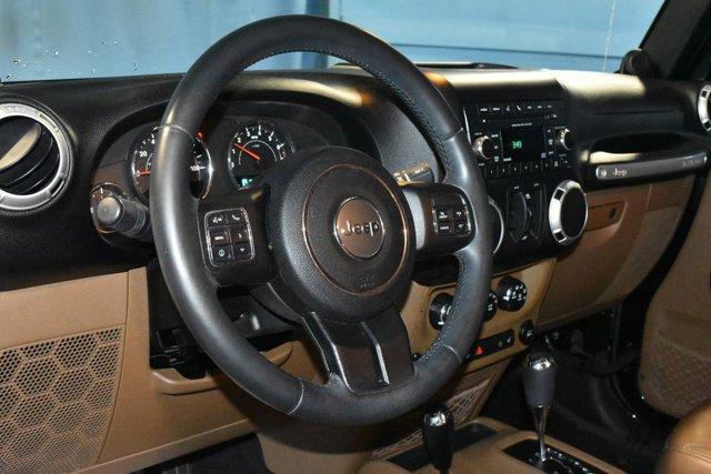 used 2014 Jeep Wrangler Unlimited car, priced at $16,240